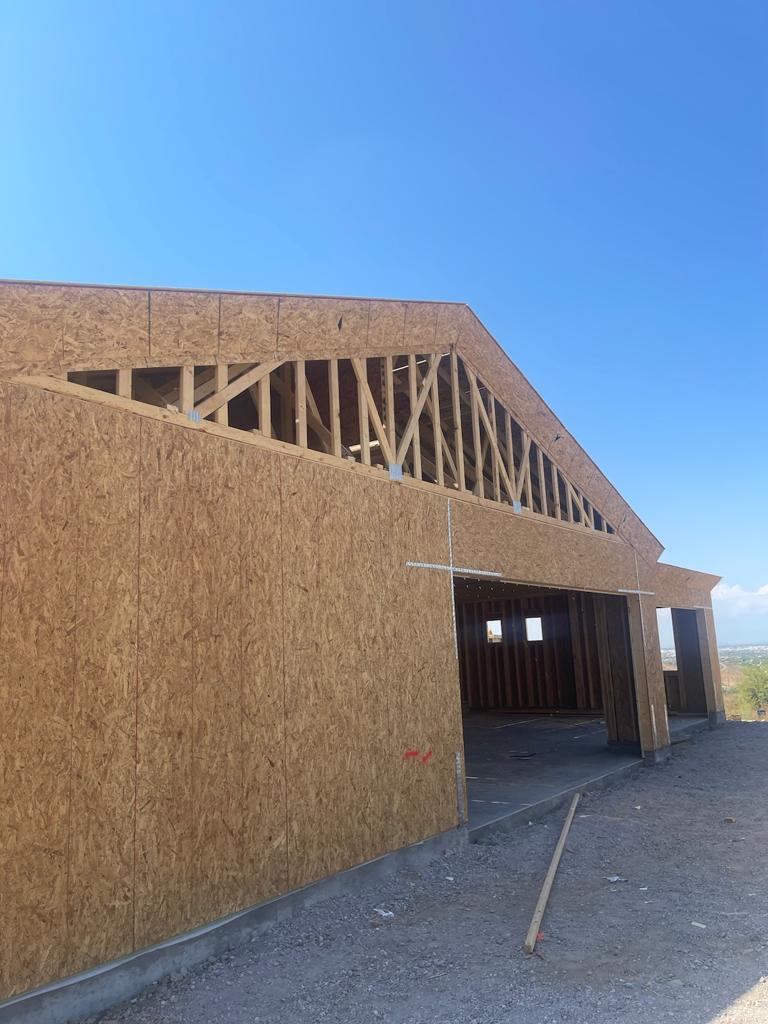 A building that is under construction with a sky background